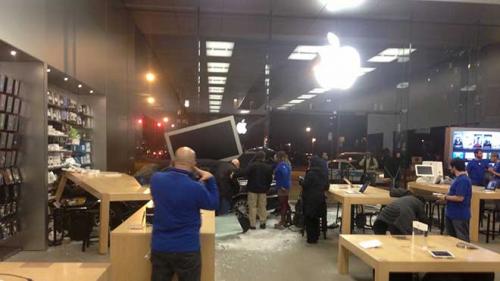 photo of Cars slams into Chicago Apple Store during business hours image