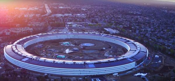 photo of New Apple Park drone footage shows advancing landscaping, near-final solar array completion image