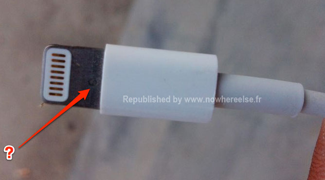 photo of Smaller iPhone dock cable shown with mystery engraving image