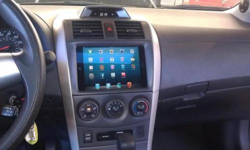 photo of iPad mini already installed in a car dashboard, could be the perfect in-car entertainment device image