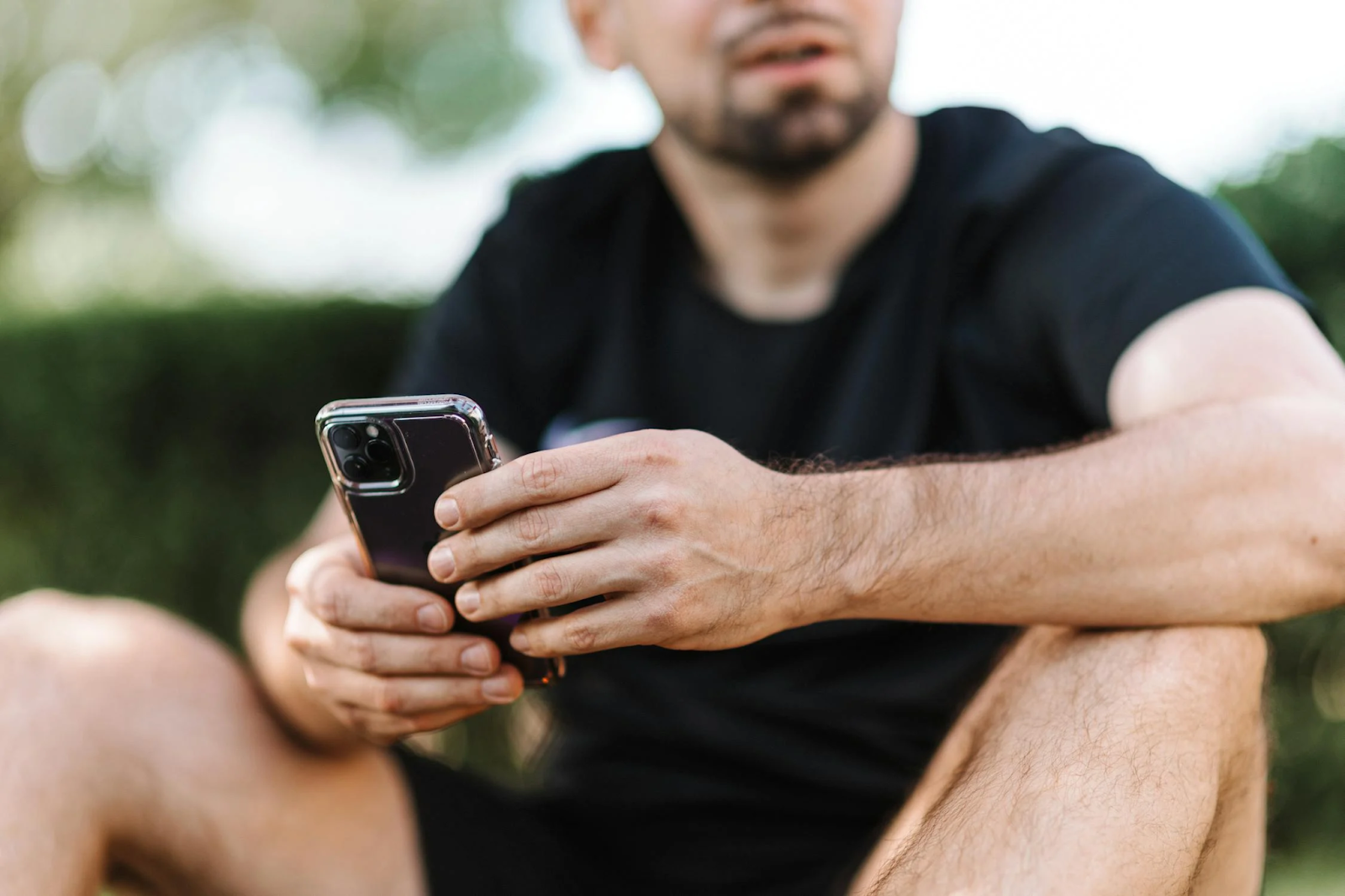 Person holding a cellphone iphone