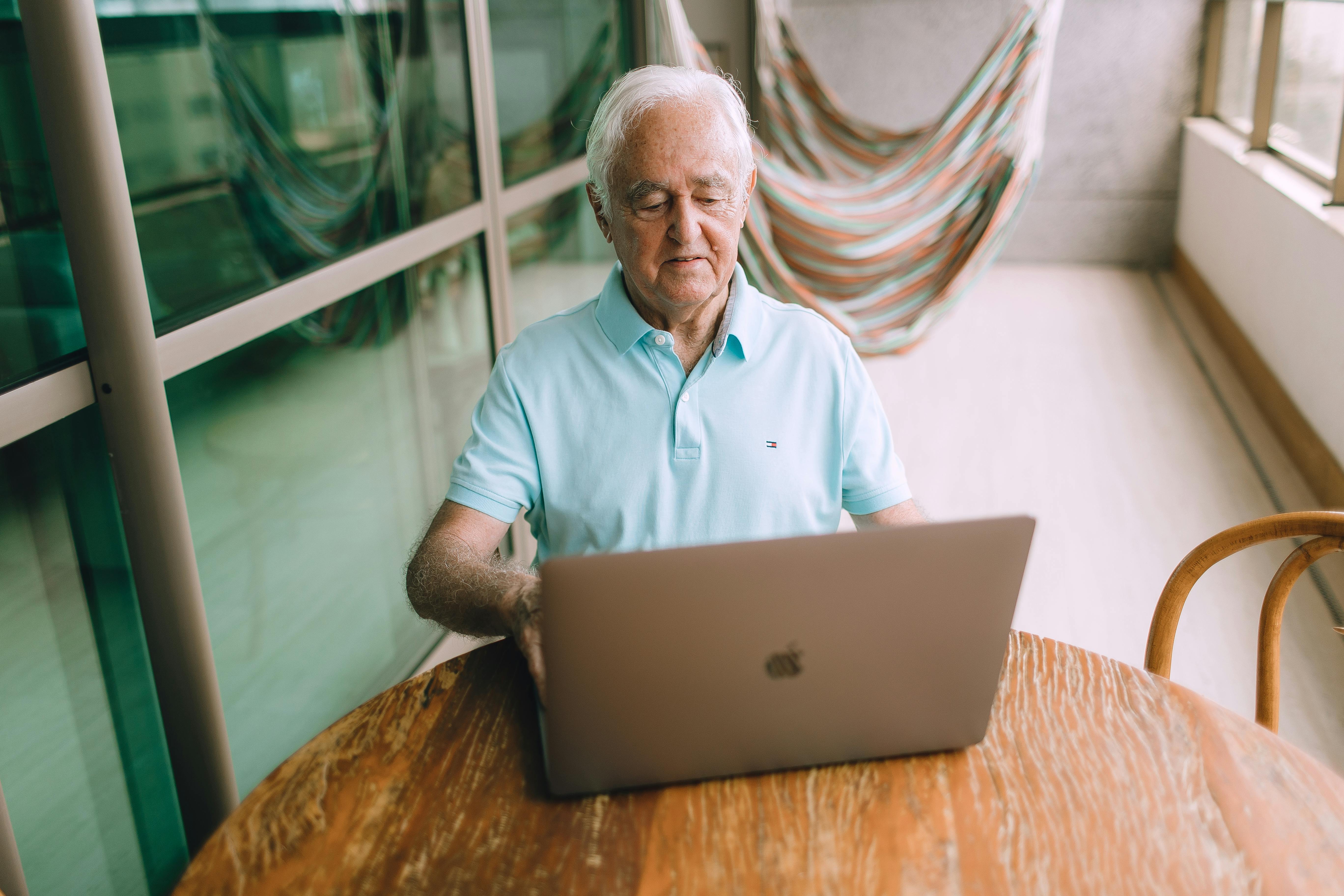 man using macbook