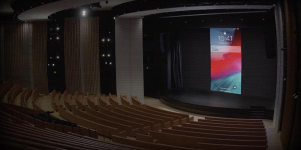 photo of Apple playfully turns on its March 25 event live stream early, showing an empty Steve Jobs Theater image