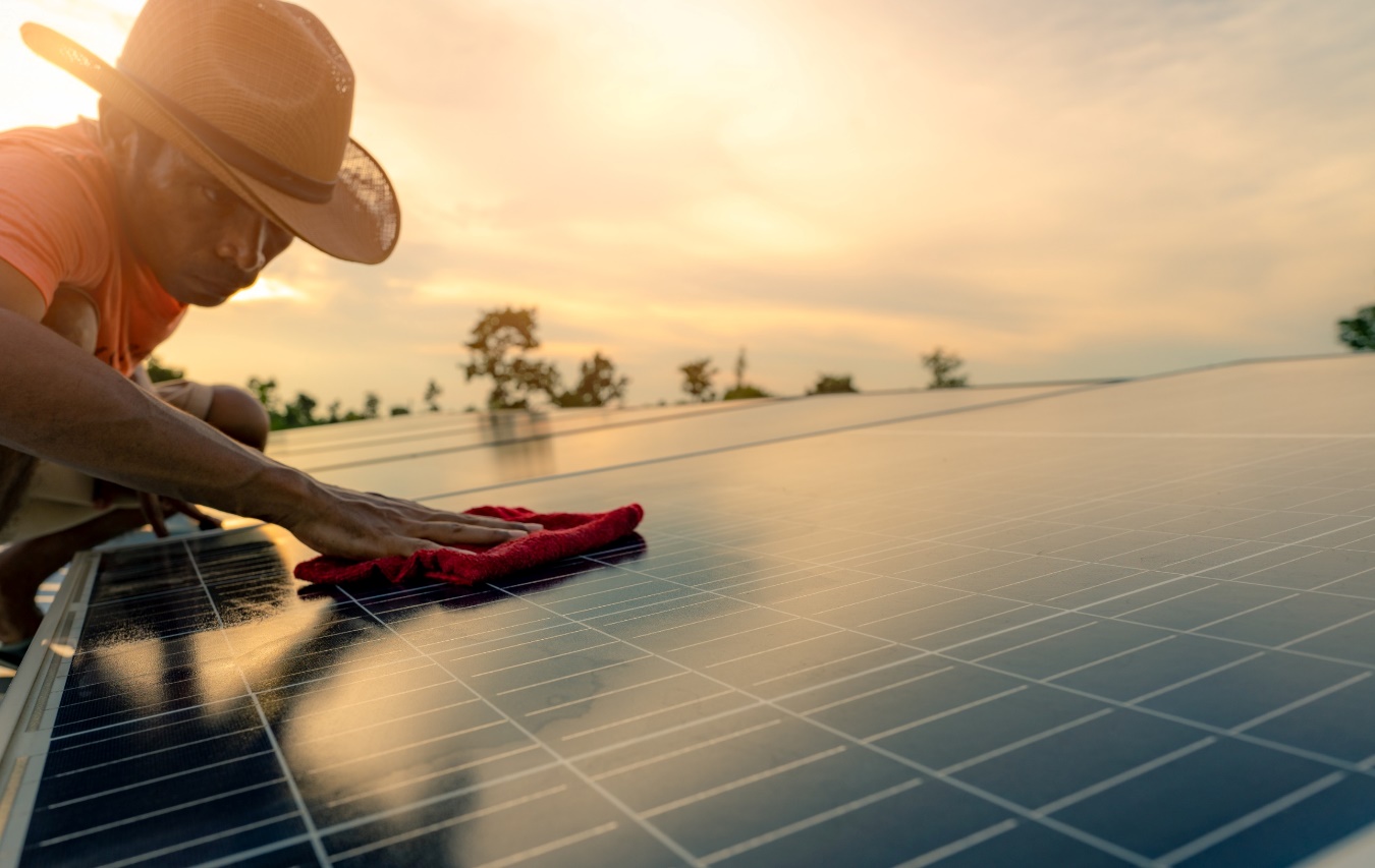 solar panels being cleaned