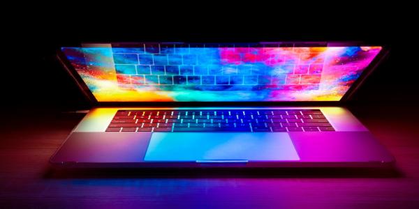 Redesigned MacBook Pro with OLED to…