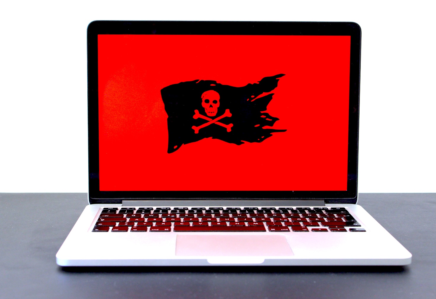 MacBook with pirate flag
