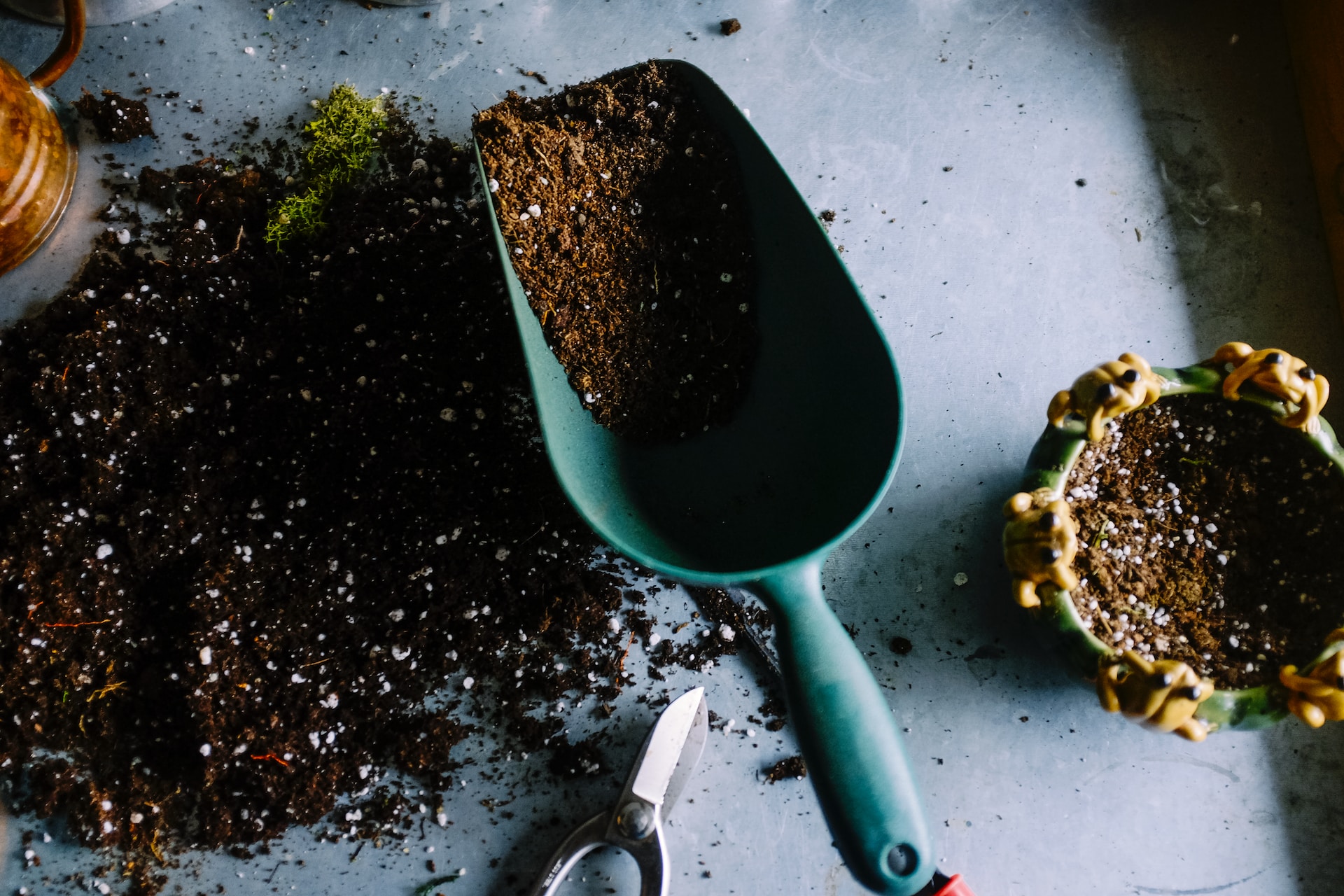 potting soil and shovel