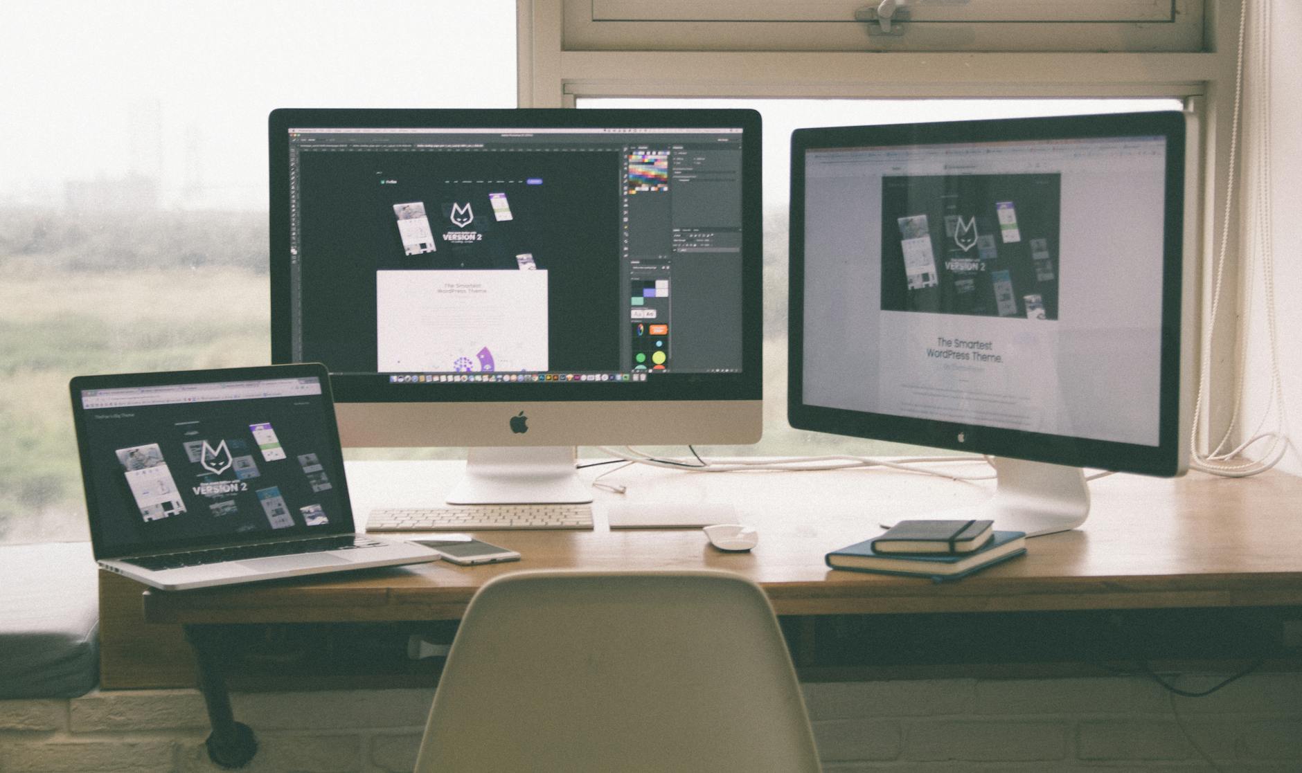 imac computers on desk